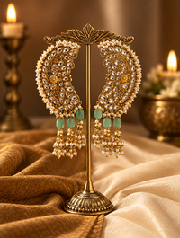 Jadau or Pacchi work crescent-shaped earrings