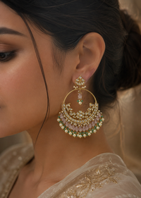 Jadau chandbali earrings with green beads and pearls