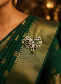 Emerald Bow Elegance AD Diamond Brooch