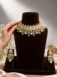 Gold-toned polki choker necklace with green beads and pearl drops